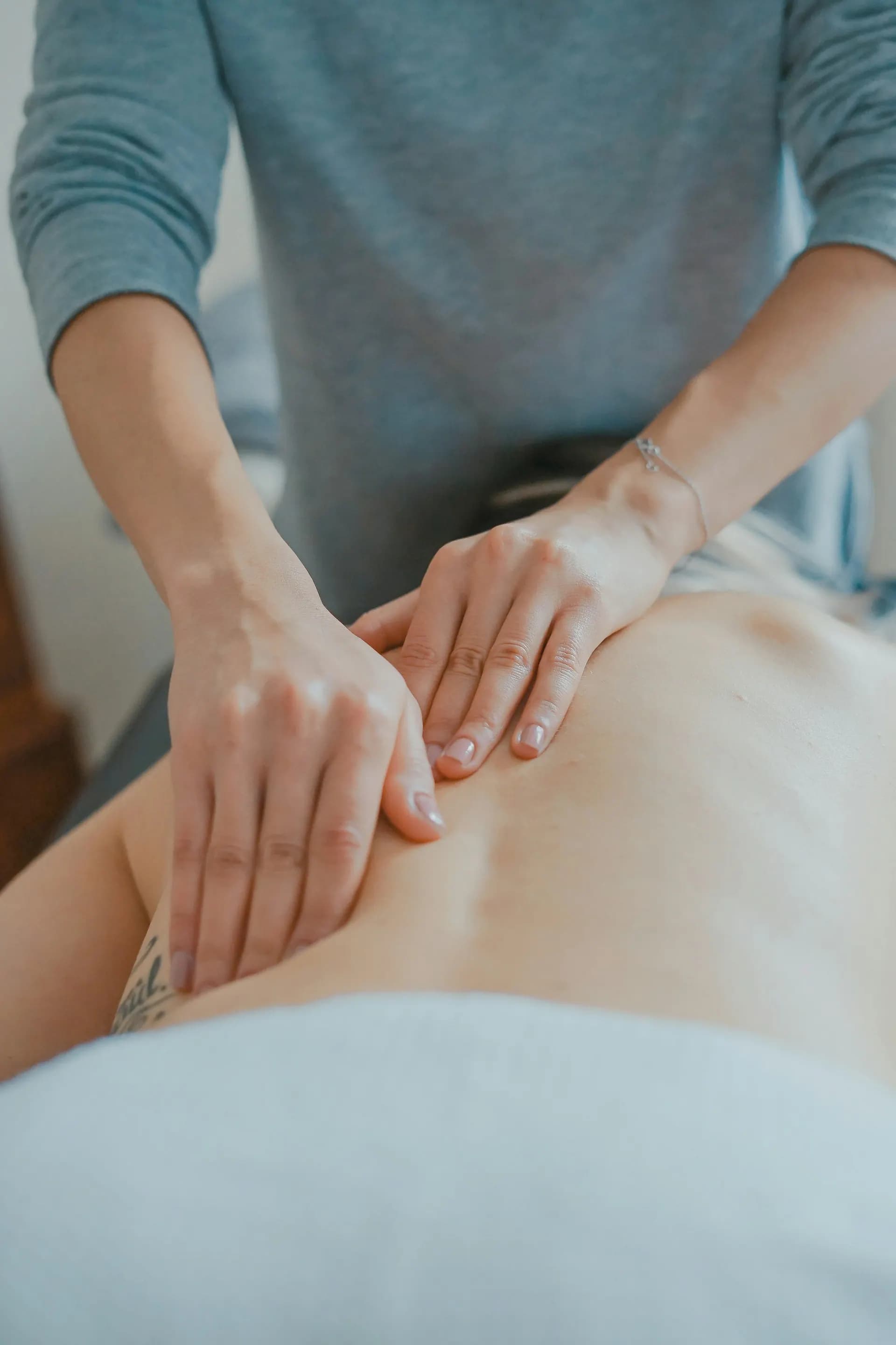Therapist working on a client's back