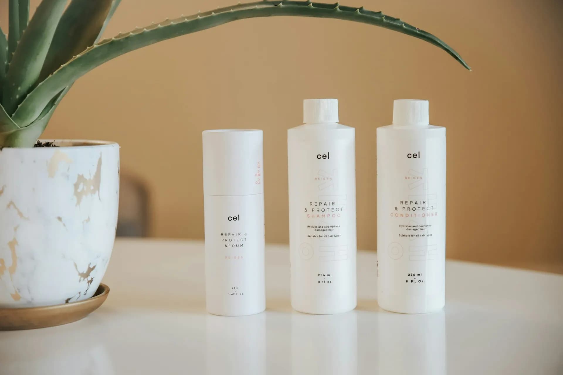 Three white skincare bottles