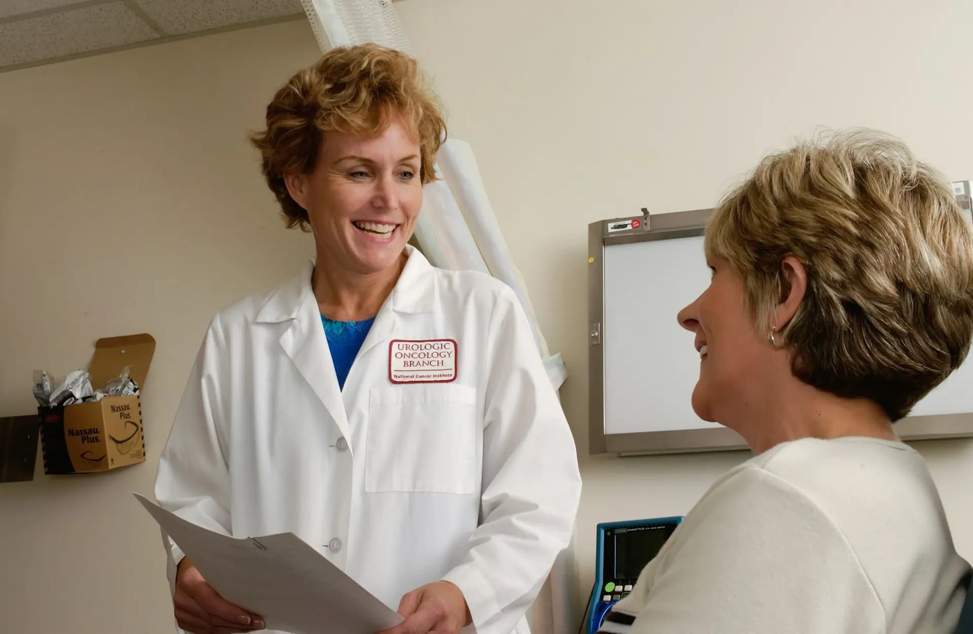 Doctor talking with a patient in a consultation room