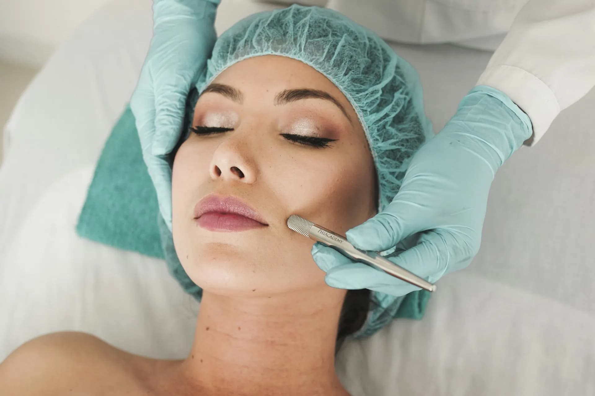 Dermatologist examining a patient's skin